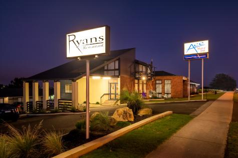 Entrance to property at night - Ace Motor Inn