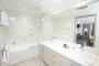 One Bedroom Suite Ensuite Bathroom with Shower over Bath & Twin Handbasins - Altitude Motel Apartments