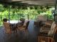 Dining & Lounge area on the expansive undercover timber deck - Daintree Riverview Lodges