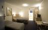 Room - Dorset Gardens Hotel-Motel