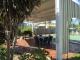 communal BBQ area adjacent to tennis court - La Solana Holiday Units