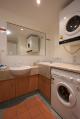Your own laundry - Mid City Luxury Suites