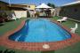 Pool area with BBQ great area for Families - Sun Palms Motel